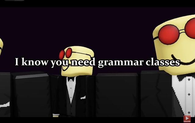 Three cartoon characters with rectangular yellow heads, wearing black suits, and red sunglasses are shown against a dark background. The middle character has text above his head that says, "I know you need grammar classes."