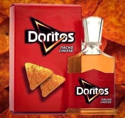 The image shows a red box and a perfume bottle designed to look like Doritos packaging. The box says "Doritos" and "Nacho Cheese". The perfume bottle has the same label and is filled with an orange liquid.