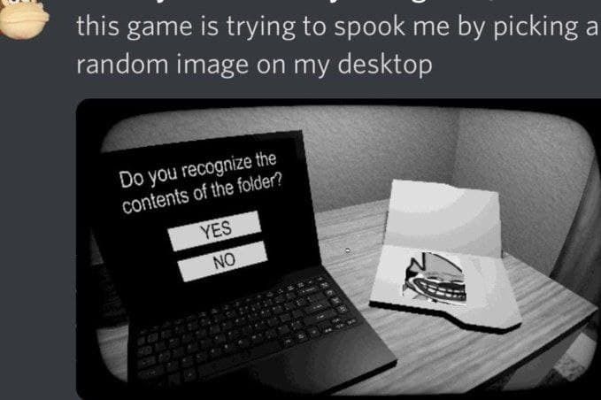 A black and white image shows a laptop on a desk with an open folder next to it. The laptop displays the question, "Do you recognize the contents of the folder?" with two buttons below labeled "YES" and "NO". The open folder displays a creepy troll face.