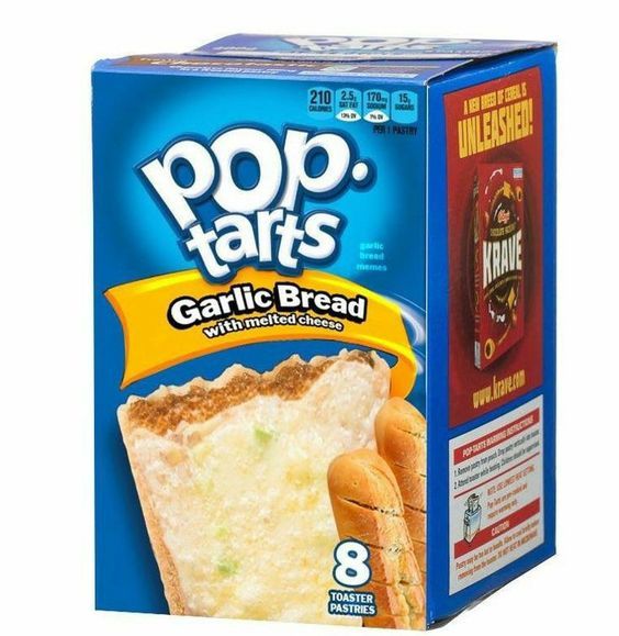 A box of Pop-Tarts with the flavor 'Garlic Bread with melted cheese'. The package shows an image of a Pop-Tart that is made of garlic bread. On the right is a red section advertising the cereal Krave. The text also includes 'garlic bread memes'. The box indicates 8 toaster pastries.