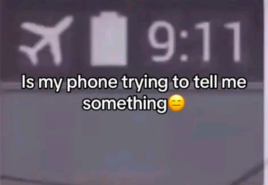 A close-up of a phone screen showing airplane mode icon, a battery icon and the time 9:11. Below the icons the text "Is my phone trying to tell me something 🤨" is placed.