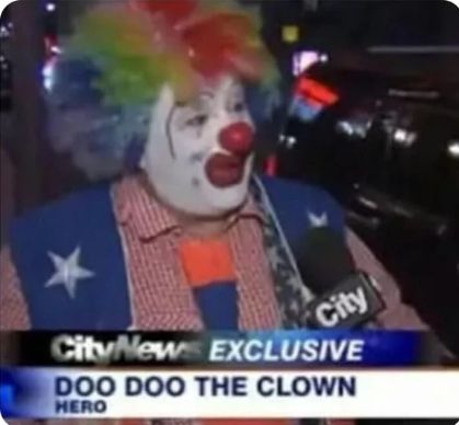 A clown with white face paint, a red nose, and rainbow hair is being interviewed by CityNews. The news banner says "CityNews EXCLUSIVE" and "DOO DOO THE CLOWN" under it. Under that, "HERO" is written.