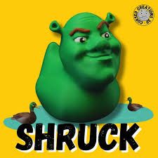 The image shows a green rubber duck with the face of Shrek, sitting on a small blue pond with two brown ducks. Below the duck is the text "SHRUCK".